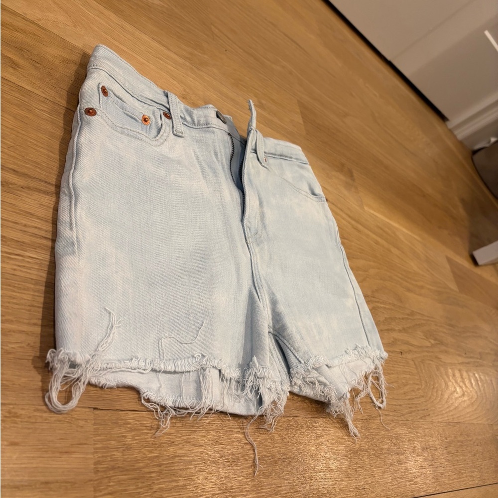 Levi’s Light Blue Distressed Denim Shorts